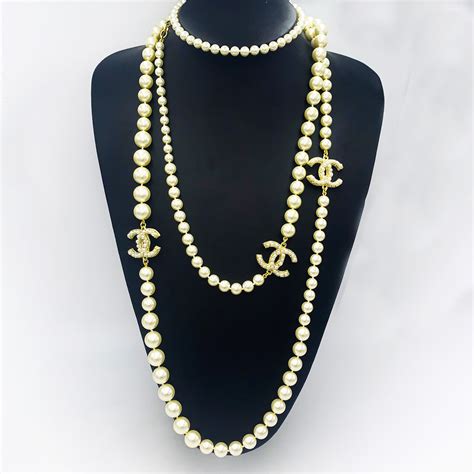 long chanel necklace with pearls.